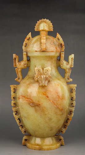 A CARVED JADE VASE AND COVER