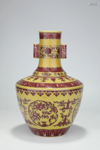 A YELLOW-GROUND IRON-RED BOTTLE VASE.MARK OF QIANLONG