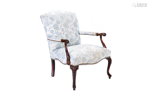 UPHOLSTERED & CARVED WOOD ARMCHAIR