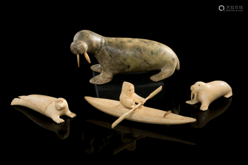 FOUR INUIT CARVED BONE AND STONE FIGURES