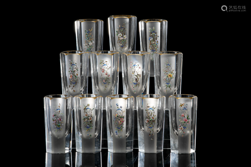 TWELVE GLASS TUMBLERS WITH ENAMEL AND GILDED RIMS