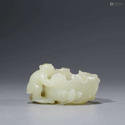 A White Jade Carved Boy Washer