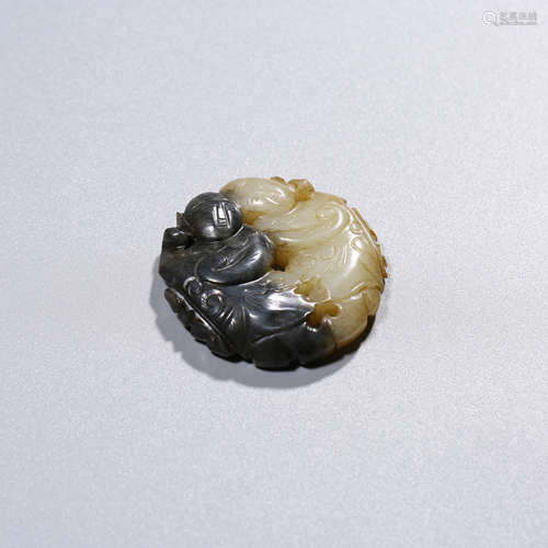 A White and Black Jade Figure Pendant