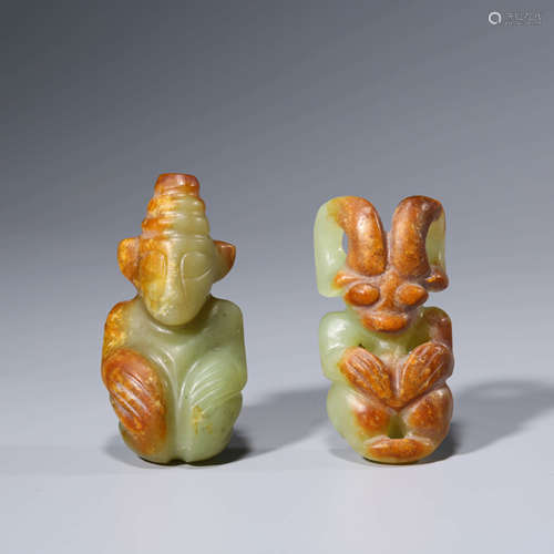 A Pair of Yellow Jade Figures