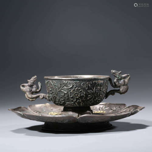 A Silver Carved Figure Cup and Saucer