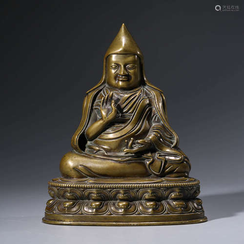 A Gilt-bronze Statue of Guru Buddha