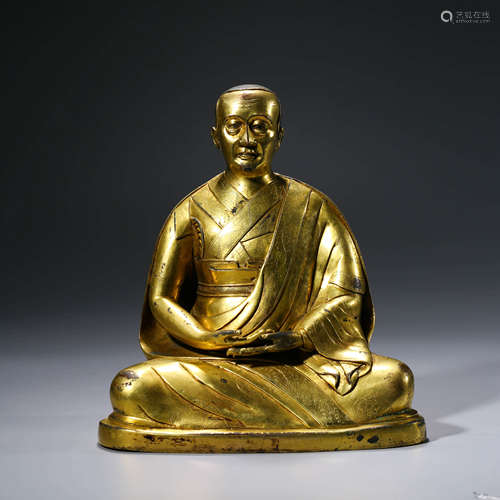 A Gilt-bronze Statue of Guru Buddha