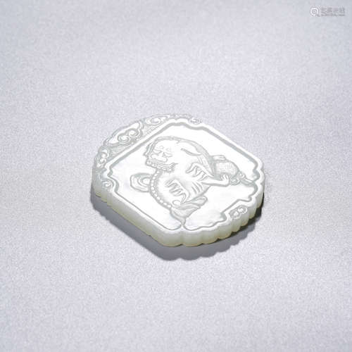 A White Jade Lion Plaque