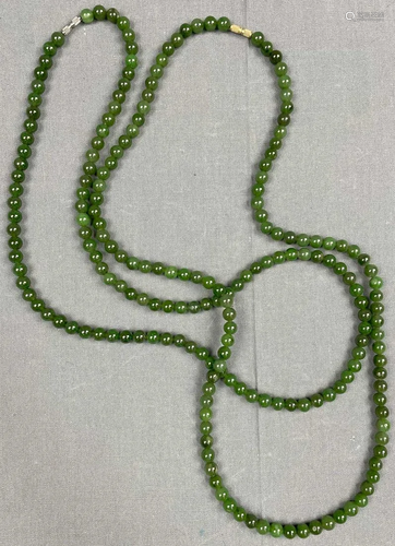 2 necklaces. Probably green jade, China.