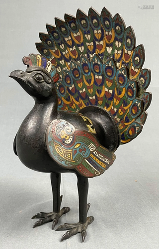 Cloisonne peacock. In ancient China style.