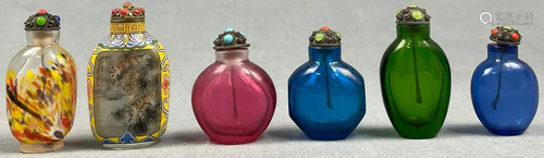 6 snuff bottles. Glass partly painted inside. Probably