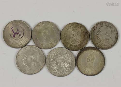 China, zeven diverse zilveren munten