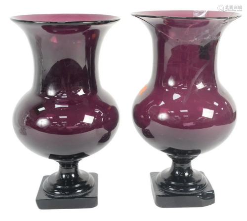 Pair of Amethyst Glass Urns having flared rim and