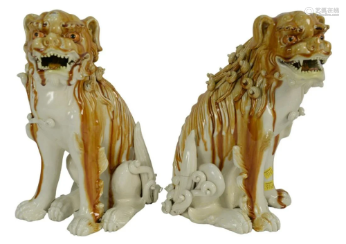 Pair of Porcelain Foo Dogs in a white and brown glaze,