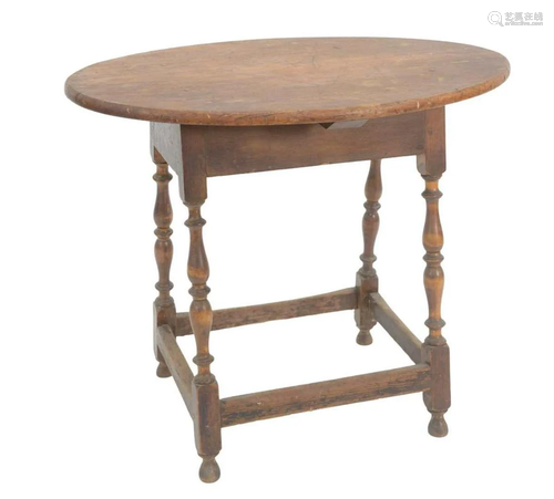 Queen Anne Table having oval top on turned legs with