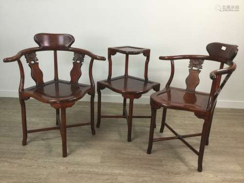 A PAIR OF CHINESE HARDWOOD CORNER CHAIRS AND A TWO TIER TABL...