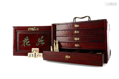 AN EARLY 20TH CENTURY CHINESE MAHJONG SET IN BRASS MOUNTED W...