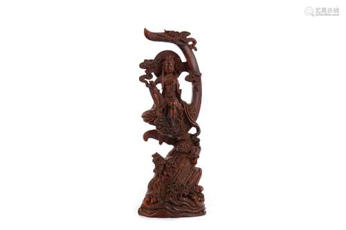 A 20TH CENTURY CHINESE CARVING OF GUANYIN