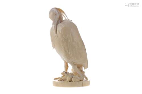 A JAPANESE IVORY CARVING OF A HERON