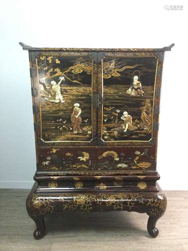 A JAPANESE LACQUERED AND SHIBAYAMA CABINET ON STAND