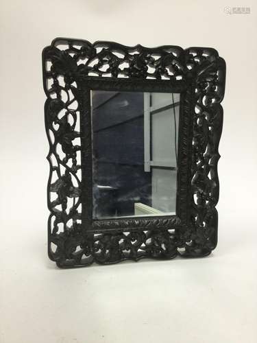 A CHINESE EBONY WALL MIRROR