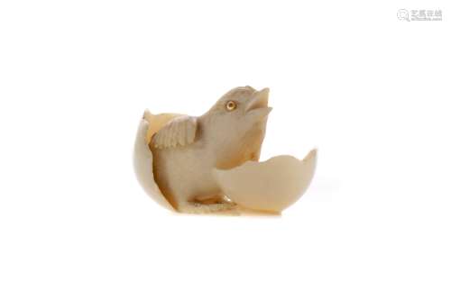 A JAPANESE IVORY CARVING OF A CHICK