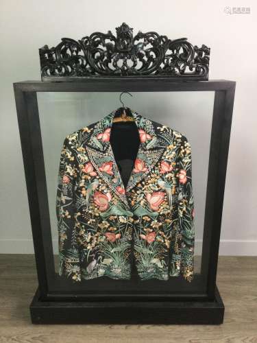 A CHINESE MAHJONG JACKET IN AN EBONISED DISPLAY CASE