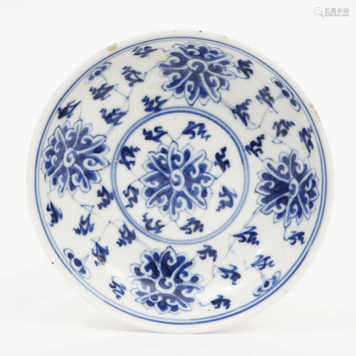 A BLUE AND WHITE PLATE