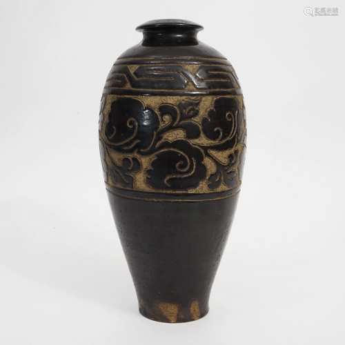 A CARVED VASE FROM CIZHOU KILN