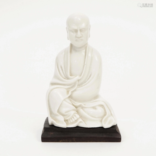 A WHITE PORCELAIN STATUE OF BODHIDHARMA