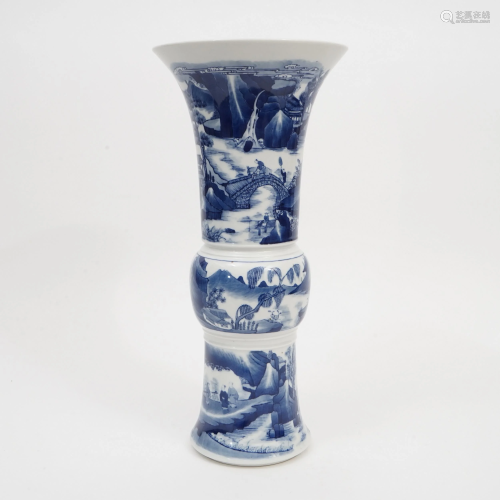 A BLUE AND WHITE VASE DECORATED WITH CHARACTERS