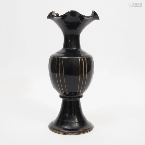 A BLACK-GLAZED FLOWER-SHAPED VASE FROM CIZHOU KILN