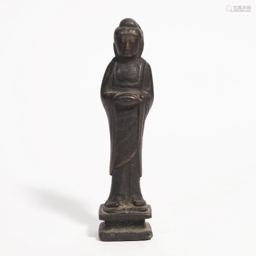 A BRONZE BUDDHA