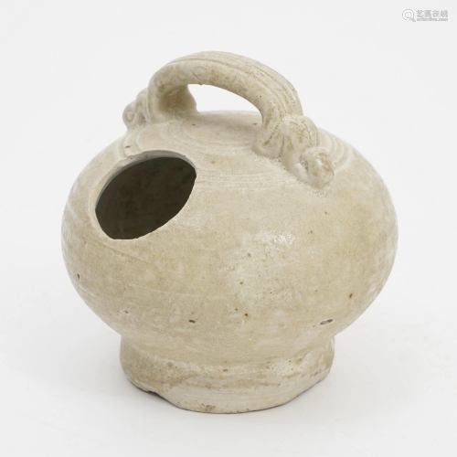 A WHITE PORCELAIN JAR