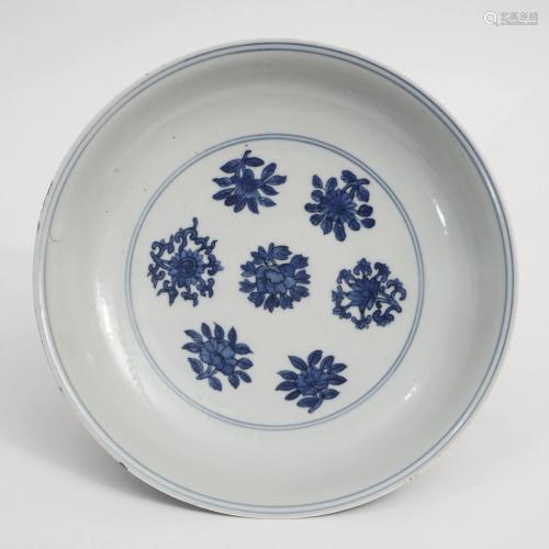 A BLUE AND WHITE PLATE