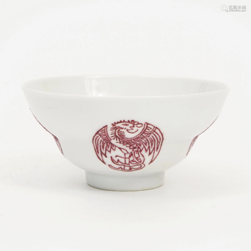 A CARMINE RED BOWL WITH PHOENIX PATTERN