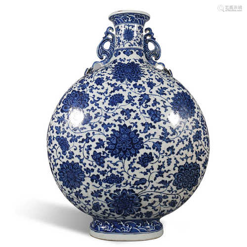 The lotus shaped flat bottle with blue and white flowers tan...