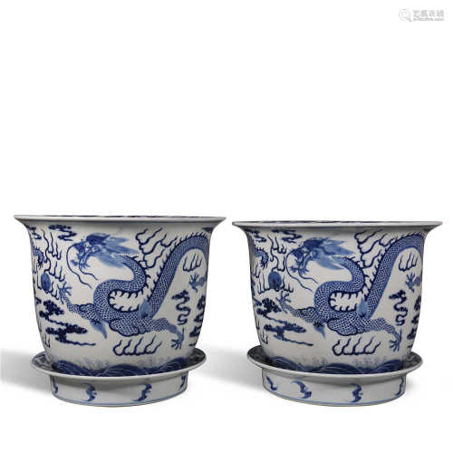 A pair of blue and white flower pots with dragon pattern in ...