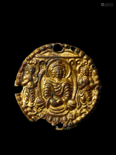 A GILT COPPER ALLOY REPOUSSÉ MEDALLION WITH BUDDHA AND WORSH...
