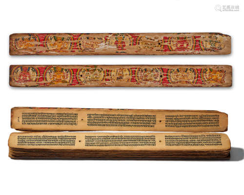 A PALM LEAF MANUSCRIPT WITH PAINTED WOOD COVERS NEPAL, CIRCA...
