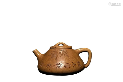 TEAPOT CARVED WITH CHARACTERS