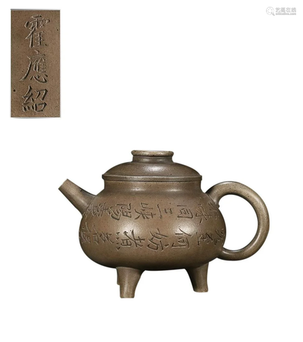 TRIPOD TEAPOT CARVED WITH CHARACTERS AND 'HUO YING