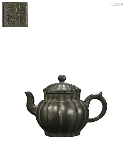TEAPOT WITH FLUTED SIDES AND 'CHEN ZHONG MEI' INSCRIBED