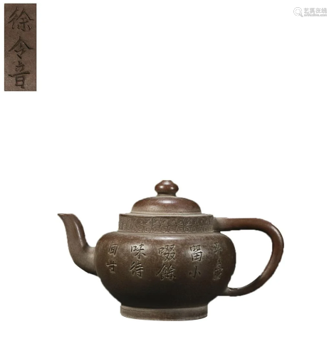 TEAPOT CAVRED WITH CHARACTERS AND 'XU LING YIN'