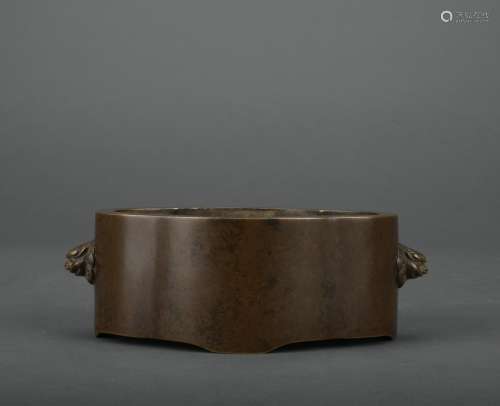 A bronze incense burner