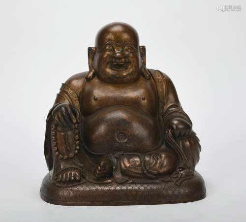 A copper Maitreya Buddha