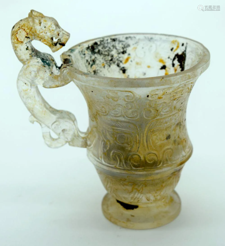 A Chinese glass Libation cup with a Dragon handle 11cm.