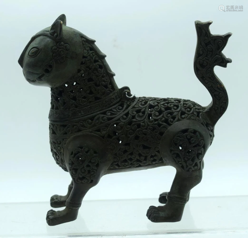 A Bronze Islamic open work Incense burner in the form