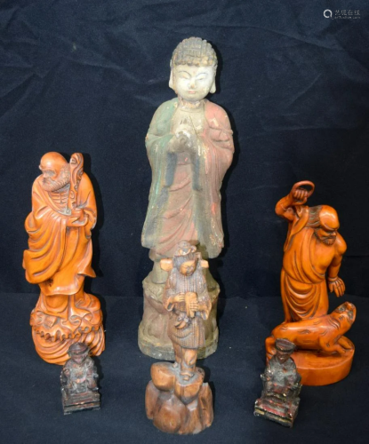 A collection of Chinese and Tibetan wooden figures