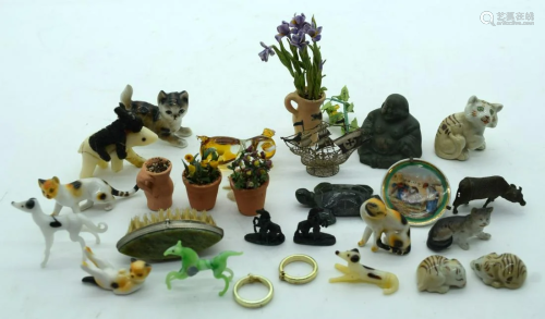 A collection of small glass animals and ornaments